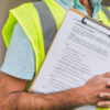 Man with clipboard check list